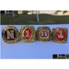 Anillos de racimo 4 piezas 1983 1994 1995 1997 Anillo de campeonato nacional de Nebraska Cornhuskers con caja de presentación de madera Hombres Fan Regalo al por mayor Dhibc