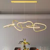 Lampadari moderni a LED a cerchio in oro rosa che illuminano la decorazione della sala da pranzo della casa, lampada a sospensione, luci a sospensione per bar da interni