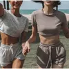 Kvinnors shorts Sommarkvinnor Sportdräkt Kort ärm Solid Crop Tops Running Fitness Set Lady Casual Slim O-Neck spetsar upp