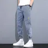 Pantaloni da uomo Pantaloni dimagranti traspiranti a vita media Pantaloni in denim Vita elastica per lavorare