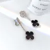 Klavertje vier luxe designer sieradenVier gras twee bloemen volledige diamanten zwarte agaat oorbellen met Panda S zilveren precisie-editie