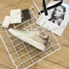 Designer casual skor klassiska kvinnor guld silver mångsidiga sneakers lyx varumärke lägenheter fashionabla bekväma utomhus löparskor