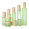 20ml 30ml 40ml 60ml 80ml 100ml 120ml Vaso di crema in vetro smerigliato verde Bottiglia di lozione spray nebulizzata con coperchi in finto legno Tappi Kngph