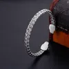 Bracciale rigido in acciaio inossidabile argento Testa di teschio da motociclista Bracciale aperto con nodo Catena metallica per regali di NATALE da uomo