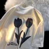 Kvinnors tshirt Summer Trendy Brand Tulip Design Sense Niche Men and Women Jacka Korean version Lossa halvärmad Y2K Top Overdized T -shirt 230425