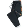 Pantalones de hombre otoño primavera verano hombres pantalones de camuflaje más el tamaño 8XL mferlier deportes pantalones de chándal elasticidad fuera de la puerta lápiz pantalones 54 56 58 230426