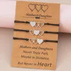 Bracelets porte-bonheur 2023 Bracelet fête des mères en acier inoxydable coeur tressé carte ornement