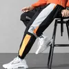 Men's Pants Streetwear Men Black Joggers Pants Mens Big Pockets Ribbons Hiphop Cargo Pants Male Overalls Sweatpants Men Clothes 230425