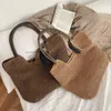 Damen-Strandtasche mit großem Fassungsvermögen, Sommer, gewebt, hohl, für Reisen am Meer, einfache Einkaufstasche, Mode, Luxus-Designer-Handtasche, Segeltuchfutter, Einkaufszentrum, Einkaufsumhängetaschen