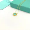 Collana con pendente rotondo deluxe da donna con collana monogramma TT in oro 18kt con marchio ufficiale, non si ossida mai Anallergico DHL gratuito