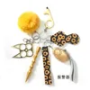 Girl Ladies Key Chain Set, ingesteld met handdesinfecteur, fluitje en pompoms