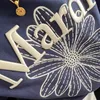 Sweats à capuche pour hommes et femmes Jimo Fashion Brand Automne Pull Lettre Fleur Industrie lourde Little Daisy Mardi Col rond Casual Top Femme Oo