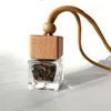 10ml pequeno difusor de ambientador de carro transparente frascos de perfume de vidro quadrado com corda pendurada tampa de madeira energia natural cristal qpqxc