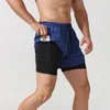 Mężczyźni śledzą luźne trzypunktowe spodnie oddychające szybkie suche podszewka przeciw luminescencji podwójna warstwowa fitness Szorty maratonowe