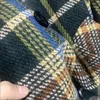 Wełniane mieszanki damskiej wełny w stylu Tweed Tweed Długie wełniany płaszcz zima luźna mieszanka gęstość kurtki Koreańskie ciepłe bawełniane wyściełane Casacos 231124