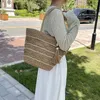 Kvällspåsar Kvinna till försäljning 2023 Högkvalitativ sommar Braid Hollow Out Tassel Beach Vacation Mini Shoulder Portable Walle