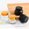 15g 30g 50g Amber Clear Cream Glass Jars Empty Container Refillable Cosmetic Bottle with White Inner Liners and Black Gold Lids Xckuw