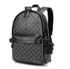 2022 Diseñador Negro grabado en relieve Mochilas Bolsos Hombres Mujeres Mochilas de cuero genuino Mochila escolar Moda Dama Mochila Mochila presbicia Mochila 571 Bolsas