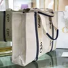 70% Factory Outlet korting WOODY Tote Handtassen Totes Dames Cross Body Klassiek Grote capaciteit met handvatten Letters Canvas Winkelen Strandtas Kerstcadeau in de uitverkoop