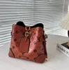 2024 NEONOE MM Borse firmate Borsa a tracolla Borsa a tracolla Fiore marrone Borse Luxurys Borse da donna Borsa da donna firmata Borse a secchiello Totes Borsa con coulisse M44020