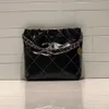 Nouveau shopping paresseux vent vague Lingge chaîne en cuir véritable seau sac à ordures sacs à main en gros 30 dollars