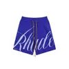 Män shorts brev tryck sommar avslappnad lös elastisk midja dragkropp korta byxor jacquard shorts