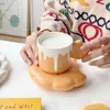 Muggar Creative Ceramic Biscuit Design Mugg Coffee Cup med tefat sätter hög temperaturbeständig säker och hälsosamt dricksvatten 231124