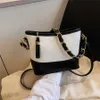 Wandering Small Fragrant Wind Lingge Chain Underarm Bag 2023 Neue schwarz-weiße Single-Shoulder-Crossbody-Tasche für Damen Großhandel Handtaschen 30 Dollar