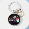 Porte-clés créatif de couleur noire pour la journée des infirmières, pendentif coloré, temps d'impression rond en alliage pour sac de voiture, porte-clés bijoux cadeau