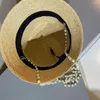 Cappelli a tesa larga 2023 Borsa a secchiello con perle in rafia moda Cappello da sole per esterno da donna