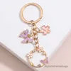 4pcs chaveiros de chaves de esmalte fofo Butterfly Butterfly SAKURA FLOR CHAIN ​​CHAIN ​​CHAINS CHAINS CHEIROS DE AMIDADE PARA MUNHAS GIRLAS