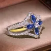 Anelli a grappolo Anello con croce in zircone con occhio di cavallo in cristallo blu di alta qualità Regalo di gioielli bicolore placcato in oro europeo e americano