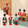 Christmas Decorations 1PC 12cm Wooden Nutcracker Doll Soldier Miniature Figurines Vintage Handcraft Puppet Year Christmas Ornament Home Decoration 231124