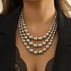 Colliers pendentifs bijoux exagérés empilés avec une chaîne de clavicule de perles géométriques multicouches hip-hop doux mélange de vent frais tissé