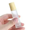 5ml 10ml Roll On Bottle Frosted Clear Glass Roller Flessen met houtnerf Plastic dop voor etherische olie Npxoc