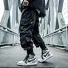 Herrbyxor houzhou svarta lastbyxor män joggar hip hop techwear byxor hippie lastbyxor för män streetwear plus storlek fickor överdimensionerad 231124