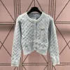 23SS Suéter Mujeres Diseñador Suéteres Invierno Nuevo Botón Cardigan Kint Abrigo Mujer Moda Carta Prendas de punto Chaqueta de manga larga Cuello redondo