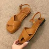 İçi boş stil sandalet kokulu yaz dışarı tek satır toka düşük topuk çocuklar için düz renk baotou düz dip plaj ayakkabıları 6067