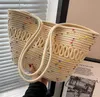 Designer-zelfs-neveltassen 2023 Zomer handgeweven stro strandbakken voor dames vintage holle handtassen mand rattan schoudertas