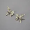 Stud Earrings European And American Creative Design Metal Texture Liquid Butterfly Zircon Flash 925 Silver Needle