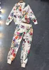 Tuta da donna con stampa floreale moda Tute firmate da donna Manica lunga Colletto alla coreana Giacca e pantaloni sportivi con coulisse Set da 2 pezzi Abbigliamento donna