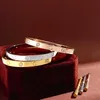 Love Bracelet Designer Jóias Buzina dourada Bracelete parafuso Pulveração de bracelete Bracelete de titânio Broche de aço Mulheres prateadas e homens Presente de festa com caixa