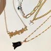 Chaînes Flatfoosie mode Babygirl lettre papillon perlé collier pour femmes multicouche asymétrique perle métal tour de cou bijoux