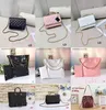 En kaliteli yüksek kaliteli tasarımcı çanta elmas kafes crossbody çanta cf serisi omuz çantası woc lüks çanta hobo çanta çantalar çantalar tasarımcı kadın çanta