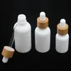 Opal White Glass Bottle 15ml 30ml 50ml with Bamboo Dropper 1OZ Wooden Essential Oil Bottles Porcelain Uoiak