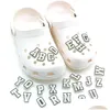 Schoenonderdelen accessoires moq 50 stcs gloeien in de donkere croc jibz combinatie Engelse letters fluorescerende 2D soft pvc decoraties lumino dhk5t