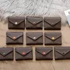 Sac portefeuille en cuir entier pour femmes Multicolor Designer portefeuille courte porte-carte Lady Purse Classic Zipper Pocket Hasp Lettre 284Q