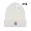 Novo designer de inverno boné de malha de lã chapéu de lã das mulheres dos homens grosso quente pele do falso pom chapéus feminino bonnet k-12