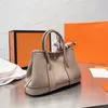 Borse casual da donna Borse firmate in pelle di alta qualità Borsa a tracolla con manico superiore alla moda Borsa a tracolla con pony e nastri 25 cm