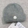 Brimlös hatt designer män kvinnor stickad hatt höst vinter ull hatt brev jacquard unisex kashmir brev avslappnad skalle utomhus hatt